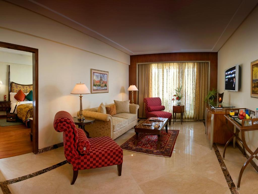 Lalit Executive Suite King Bed Complimentary One way Airport Transfers on session on Spa Enjoy Happy Hours 11 on Beverages,62829727:JPEG